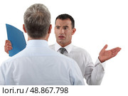 Businessman explaining himself. Стоковое фото, агентство Ingram Publishing / Фотобанк Лори