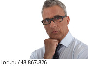 Man wearing thick-rimmed glasses. Стоковое фото, агентство Ingram Publishing / Фотобанк Лори