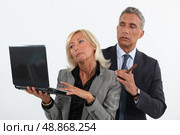 Man flirting with colleague. Стоковое фото, агентство Ingram Publishing / Фотобанк Лори