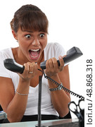 secretary overwhelmed by phone calls. Стоковое фото, агентство Ingram Publishing / Фотобанк Лори