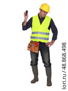 Builder being shouted at. Стоковое фото, агентство Ingram Publishing / Фотобанк Лори