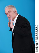 Businessman with his hands up. Стоковое фото, агентство Ingram Publishing / Фотобанк Лори