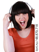 Woman listening to music. Стоковое фото, агентство Ingram Publishing / Фотобанк Лори