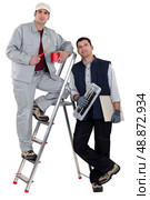 Painter and tiler. Стоковое фото, агентство Ingram Publishing / Фотобанк Лори