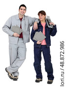 Man and woman tilers. Стоковое фото, агентство Ingram Publishing / Фотобанк Лори