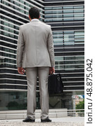Businessman with gray suit, back view. Стоковое фото, агентство Ingram Publishing / Фотобанк Лори
