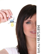 blue-eyed brunette with dummy. Стоковое фото, агентство Ingram Publishing / Фотобанк Лори