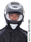 Man with bike helmet. Стоковое фото, агентство Ingram Publishing / Фотобанк Лори