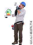 Man with a speaker and energry info. Стоковое фото, агентство Ingram Publishing / Фотобанк Лори