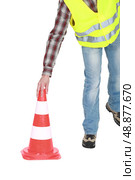 Worker with a traffic cone. Стоковое фото, агентство Ingram Publishing / Фотобанк Лори