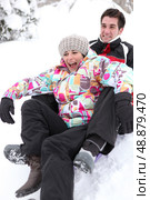 Couple on a sledge. Стоковое фото, агентство Ingram Publishing / Фотобанк Лори