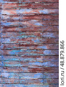 Old rustac metal fens. Blue and orange vintage background. Стоковое фото, фотограф Елена Добрынина / Фотобанк Лори