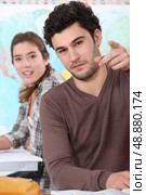College students in a classroom. Стоковое фото, агентство Ingram Publishing / Фотобанк Лори