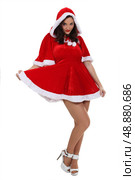 Woman dressed as sexy Mrs. Claus. Стоковое фото, агентство Ingram Publishing / Фотобанк Лори