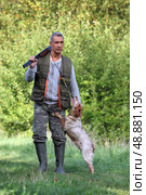 Hunter with dog. Стоковое фото, агентство Ingram Publishing / Фотобанк Лори