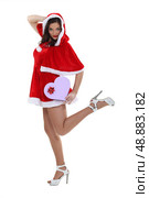 Sexy woman dressed as Mrs. Claus. Стоковое фото, агентство Ingram Publishing / Фотобанк Лори