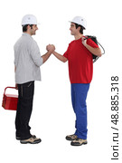 Two artisans greeting each other. Стоковое фото, агентство Ingram Publishing / Фотобанк Лори