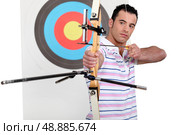 Portrait of a professional archer. Стоковое фото, агентство Ingram Publishing / Фотобанк Лори