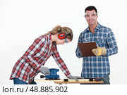 Craftsman and craftswoman. Стоковое фото, агентство Ingram Publishing / Фотобанк Лори