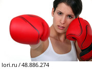 Woman with boxing gloves. Стоковое фото, агентство Ingram Publishing / Фотобанк Лори
