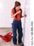 young handywoman. Стоковое фото, агентство Ingram Publishing / Фотобанк Лори