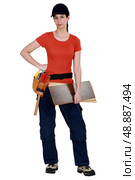 Female carpenter posing. Стоковое фото, агентство Ingram Publishing / Фотобанк Лори