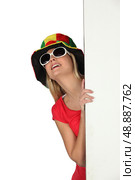 woman with a colorful hat. Стоковое фото, агентство Ingram Publishing / Фотобанк Лори