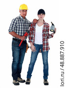 Male and female plumbers. Стоковое фото, агентство Ingram Publishing / Фотобанк Лори