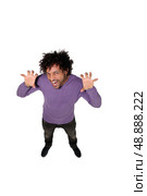 Man making scary face. Стоковое фото, агентство Ingram Publishing / Фотобанк Лори