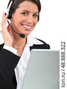 Young receptionist with headset. Стоковое фото, агентство Ingram Publishing / Фотобанк Лори