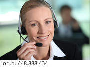 Female call-center worker. Стоковое фото, агентство Ingram Publishing / Фотобанк Лори
