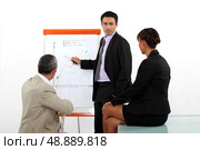 Businessman presenting finacial results. Стоковое фото, агентство Ingram Publishing / Фотобанк Лори