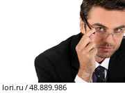 Well dressed man touching glasses. Стоковое фото, агентство Ingram Publishing / Фотобанк Лори