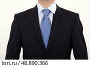 Close-up of man wearing suit. Стоковое фото, агентство Ingram Publishing / Фотобанк Лори