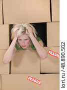 Stressed blond woman. Стоковое фото, агентство Ingram Publishing / Фотобанк Лори