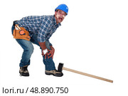 Builder dropping hammer on foot. Стоковое фото, агентство Ingram Publishing / Фотобанк Лори
