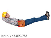Female laborer relaxing. Стоковое фото, агентство Ingram Publishing / Фотобанк Лори