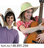 Two people with acoustic instruments. Стоковое фото, агентство Ingram Publishing / Фотобанк Лори