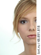 Closeup of a serious young woman. Стоковое фото, агентство Ingram Publishing / Фотобанк Лори