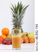 A glass of multivitamin juice. Стоковое фото, агентство Ingram Publishing / Фотобанк Лори