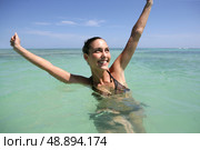 Woman enjoying a refreshing swim. Стоковое фото, агентство Ingram Publishing / Фотобанк Лори