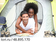 Couple in a canvas tent. Стоковое фото, агентство Ingram Publishing / Фотобанк Лори