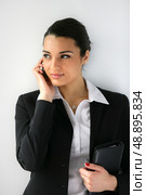 Businesswoman clutching diary. Стоковое фото, агентство Ingram Publishing / Фотобанк Лори