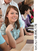 Students using computers in class. Стоковое фото, агентство Ingram Publishing / Фотобанк Лори