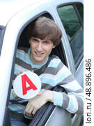 young driver proud to be an apprentice. Стоковое фото, агентство Ingram Publishing / Фотобанк Лори