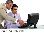 Man pointing out an error. Стоковое фото, агентство Ingram Publishing / Фотобанк Лори