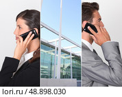 Two businesspeople using their mobile telephones. Стоковое фото, агентство Ingram Publishing / Фотобанк Лори