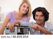Man repairing computer. Стоковое фото, агентство Ingram Publishing / Фотобанк Лори