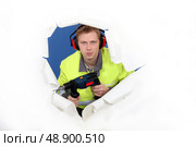 Worker with ear muffs. Стоковое фото, агентство Ingram Publishing / Фотобанк Лори