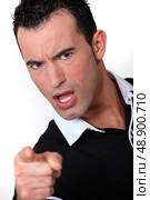Angry man pointing his finger. Стоковое фото, агентство Ingram Publishing / Фотобанк Лори